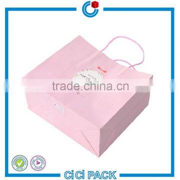 Custom high quality recyclable twist handle cosmetic pink paper bag