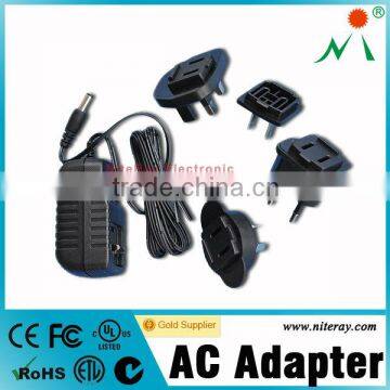 Interchange plug 220v ac to 6v dc power adapter