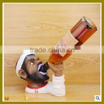 Souvenir Artificial Kobe head polyresin red wine holder for home decoration                        
                                                                                Supplier's Choice