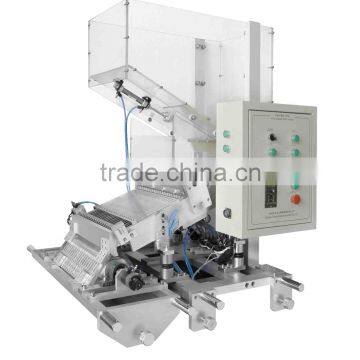 Automatic Needle Loader