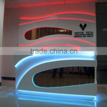 Impressive modern LED color changing office reception desk with back wall