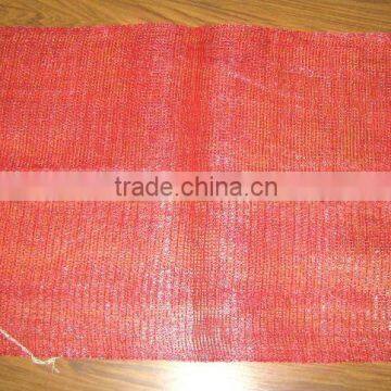 Tubular mesh bag with drawstring for packing vegetables