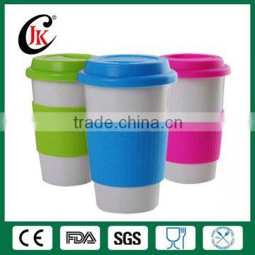 Wholesale porcelain promotional coffee mug white ceramic mug with silicone lid and sleeve