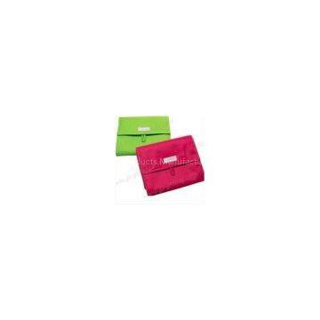 gree and red cosmetic bag