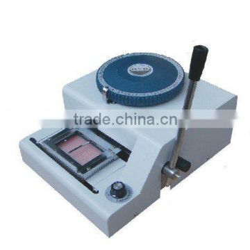 Plastic card embossing machine