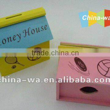 wooden money house or coin box for children