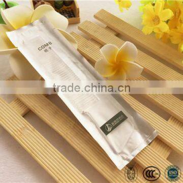 Cheap disposable hotel plastic comb with foil wrapper