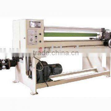 Cloth tape rewinding and cutting machine