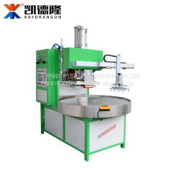 Automatic 4 position round plate blister packing machine with robot hand