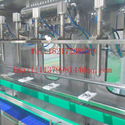 Automatic 5 Heads Liquid Weighing Filling Machine photo-3