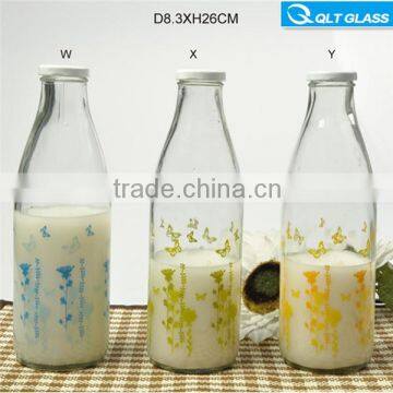 clear glass milk bottle with metal lid