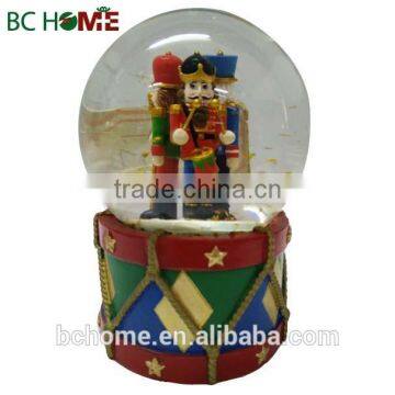 Resin nutcracker design of snow globe