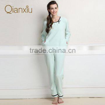 Prompt delivery Qianxiu polyester ladies pocket design pyjamas in winter