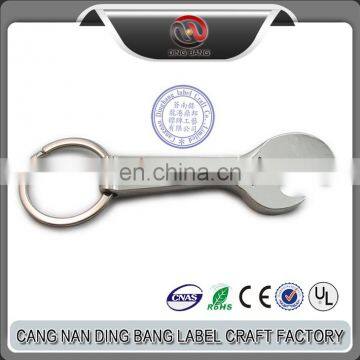 Wholesale OEM Items Custom Made Debossed Logo Metal Mini Tooling Wrench Bottle Opener With Keychain