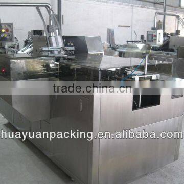 Automatic encasing machine