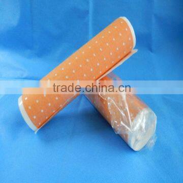 Perforated adhesive tape, skin colour