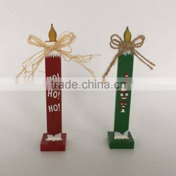 Wooden christmas CANDLE model decoration under window