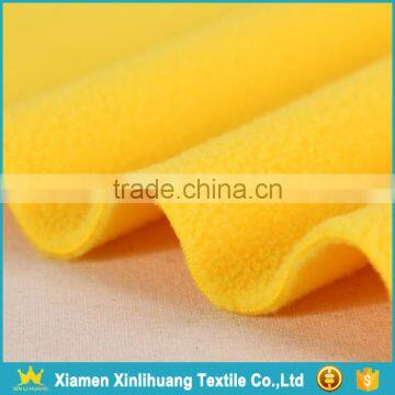 High Quality Weft Knitted Lightweight Yellow Polar Fleece Fabric photo-2