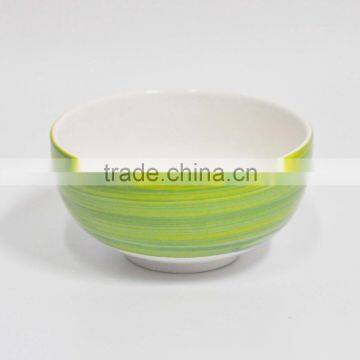 Baby feeding small ceramic rice bowl with colorful painting