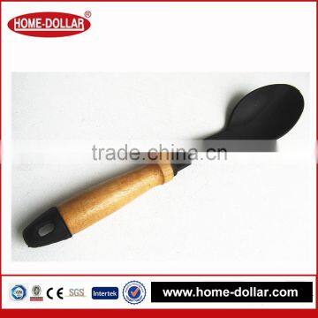 kitchen utensil and accessories big smooth spoon with wooden handle