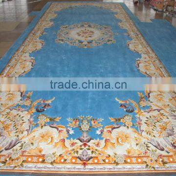 Green Pattern Handmade Carpet For Church And Auditorium