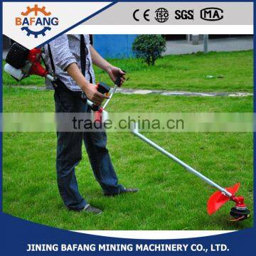 High Quality And Lowest Price 2 Stroke Side Hanging Petrol Bush cutter/ Grass Trimmer