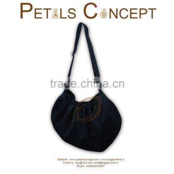 Dyed cotton hand bag with adjustable length handle