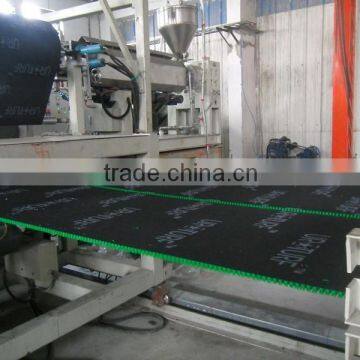 Artificial grass mat making machine