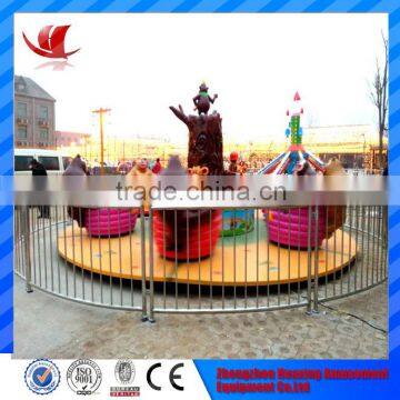 Fairground amusement park rides electric chair bear infested coffee cup for kids