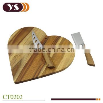 Heart shaped acacia wood cheese board and knife set