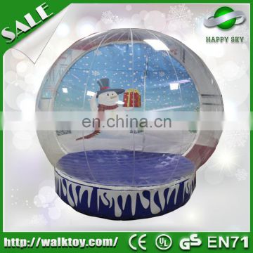 Snowman themed inflatable human size snow globe for sale