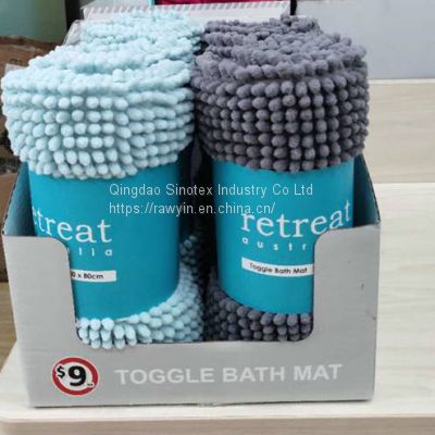 Toggle bath mat