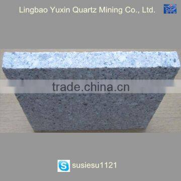 iron strapped granite slab office building