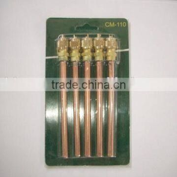 Refrigerant charging valve with brass pin, soldering charging pin valve access
