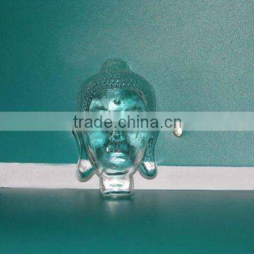 small clear buddha type cystal singular portrait