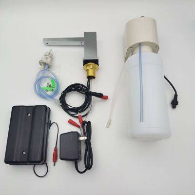 Basin Faucet Type Induction Soap Dispenser on the Table photo-3