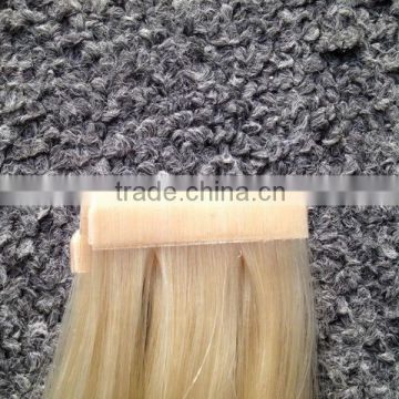 Alibaba express hot selling 100% remy human tape hair