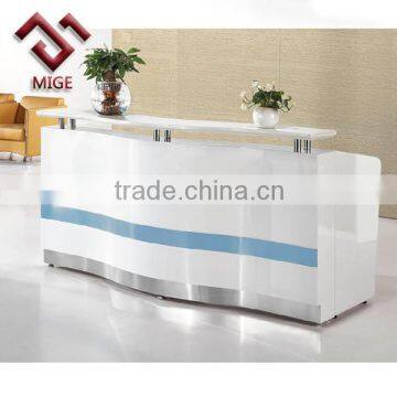 high end modern white and blue front desk