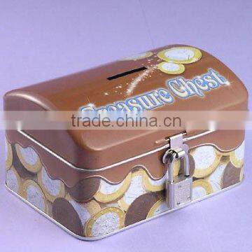 Dome shaped tin saving box with lock, key and coin hole, size 127*92*27 mm