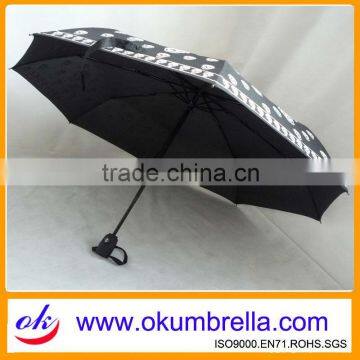 Black skull printed umbrella for sale