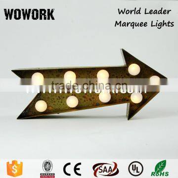 metal sign lights arrow