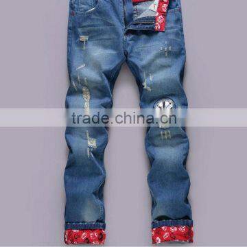 2015 Ripped Slim100% Cotton Jeans top fashion men designer jeans stock men stone washing hole blue jean trouser with opera face