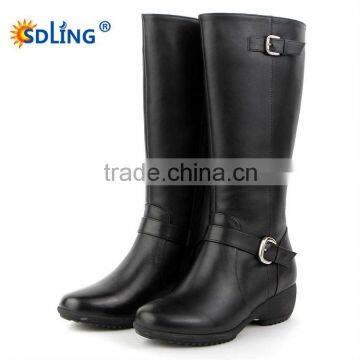 black colored genuine leather boot