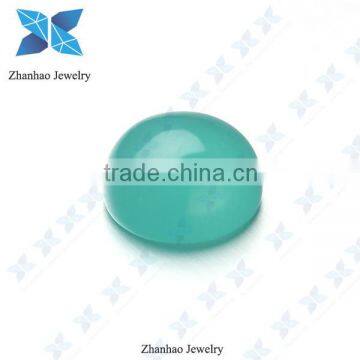 Synthetic green colored glass round cabochon