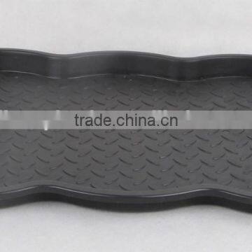 Plastic rectangular shoe tray with foot design