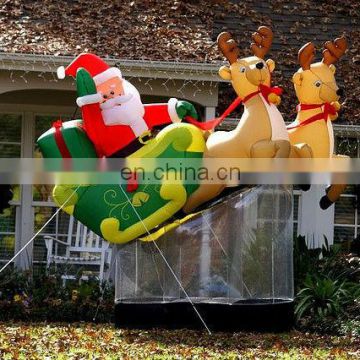 inflatable santa with sleigh and reindeer