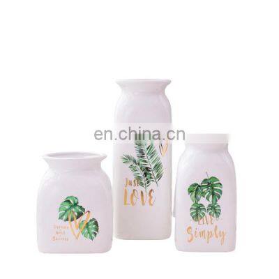 Low-key simple luxury bronzing white ceramic vase three-piece home decoration crafts