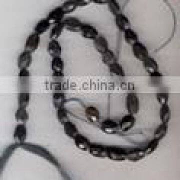 Iolite oval fac. beads