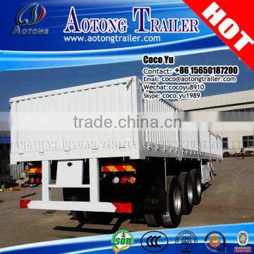 Tri-axis Uganda shipping container flatbed 40ft drop side wall trailer for sale