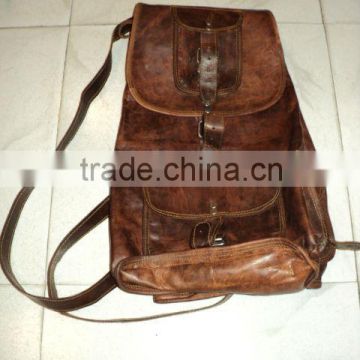 brown leather back pack bags